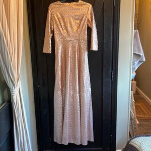 Blush sequence formal dress. Wore one day for a wedding. Altered to a size 4.